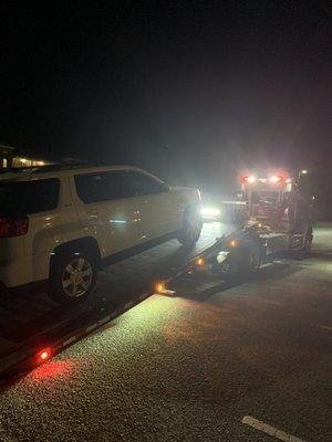 Car being towed because the engine failed.