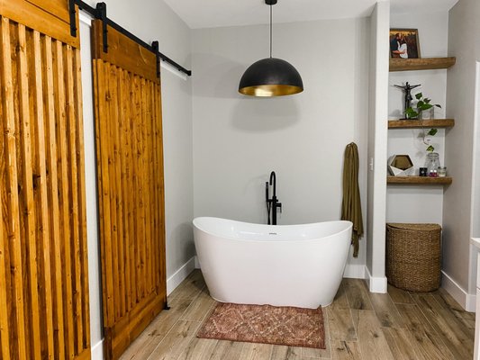 Before was a bathroom vanity we transformed this perfect space to add that soak in tub.