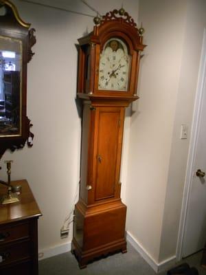 A Cherry 8 Day Grandfather Clock.