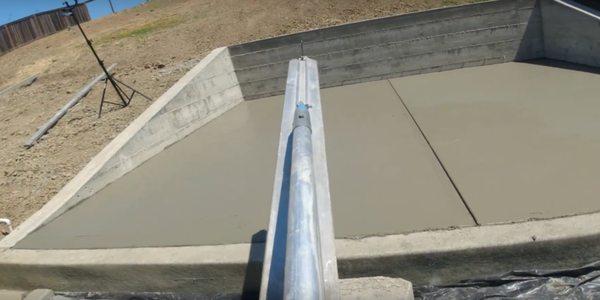 Concrete Work with Long Trowel