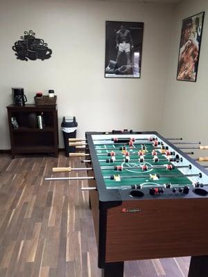 Enjoy a game of foosball and a cup of coffee at our coffee bar!