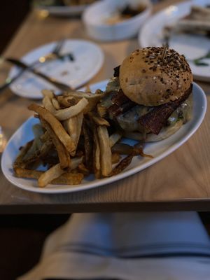 House Burger with bacon and fries.