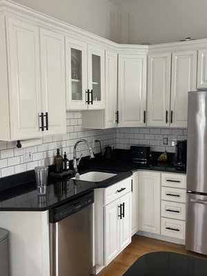 After photo of South Boston condo cabinets. We also installed the backsplash.