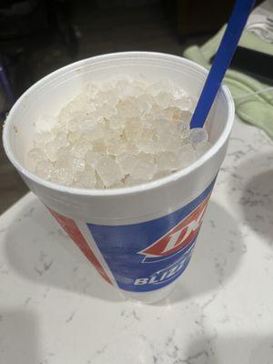 A full large cup of ice. This was her way of punishing me for inconveniencing her to correct their mistake.