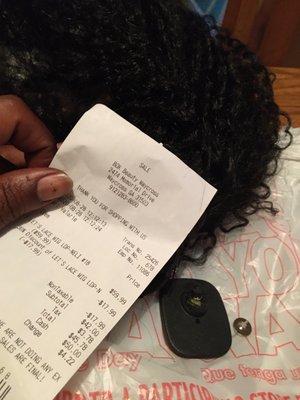 my wig, receipt ,security tag left on by OWNER, and the results safely using a cigarette lighter