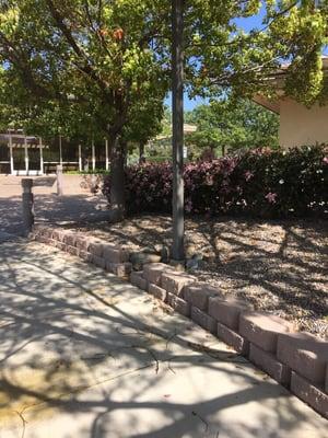 Retaining wall and rock bed