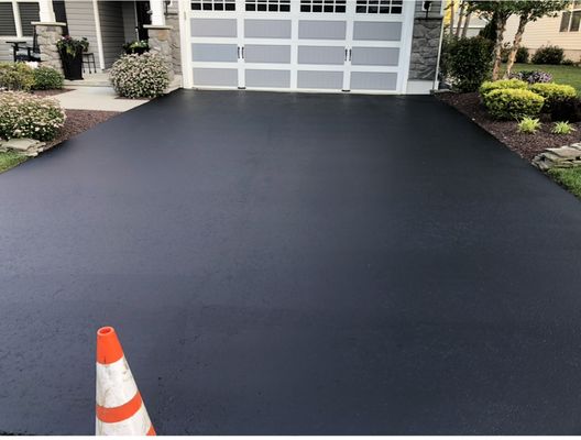 Driveway seal coating.