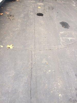 More horrible driveway job done by Michigan Asphalt at the end of 2016 season- pictures taken 1 month after driveway was "sealed"