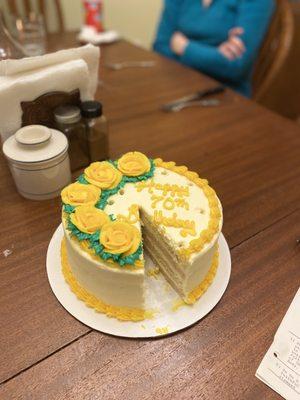 This is a lemon cake, four layers, with lemon cream filling and lemon icing. What a great way to celebrate my 70th birthday!