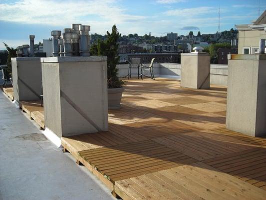 This is an example of a sectional removable rooftop deck so roof maintenance can be performed.