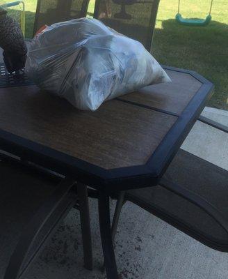 Service example - Full trash bag on top of your table!