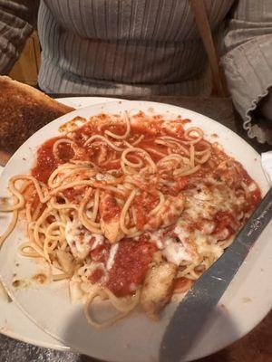 This is supposed to be chicken parm 
 But where's the chicken ? Oh ya the 3 little pieces are buried in the mountain of cheese .. ugh