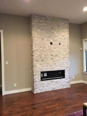 A stacked stone fireplace we just framed out on Wednesday and finished on Friday.