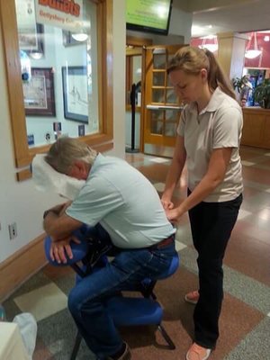 Breaktime's Nessa is pictured here giving a chair massage during Gettysburg College's parent's day event.