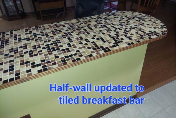 This old half-wall was given a new life when we updated it to a tiled breakfast bar