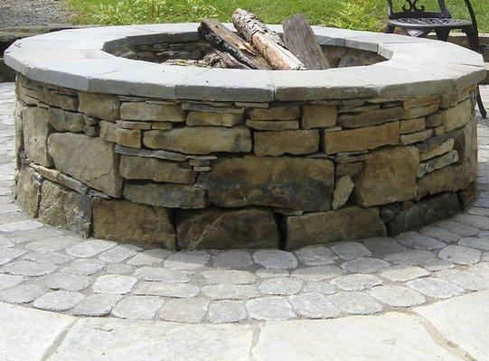 Wood burning fire pit creation. Stone Veneer.