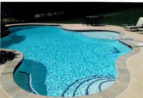 Large pool with tanning ledge