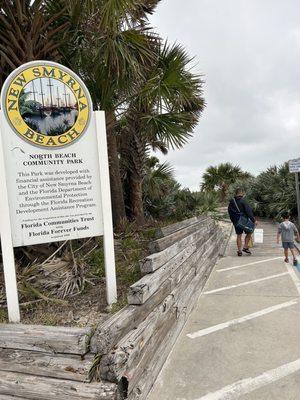 Walkway to additional parking lot that is free