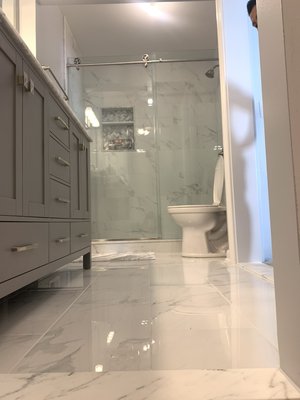 Here's a recent full Bathroom remodel with a custom shower.