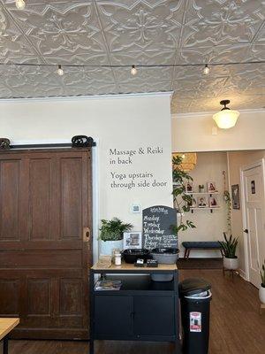 Bathroom area and door leading to yoga/massage