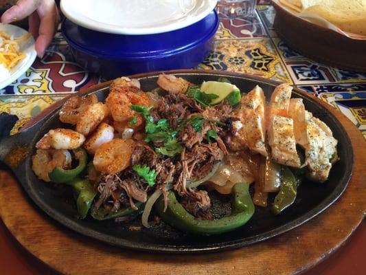 Mixed Fajita Trio, pork, chicken and shrimp.