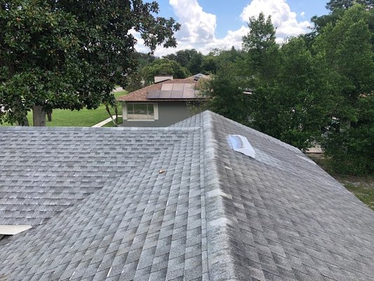 On left, what your roof looks like after our technicians removed all of the harmful growth!