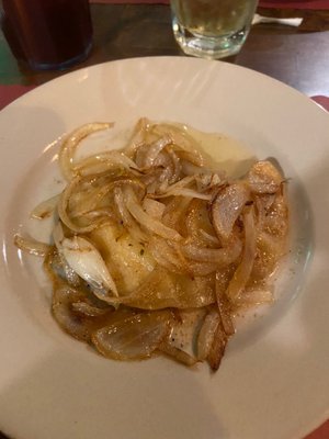 Handmade Perogi with butter and onions