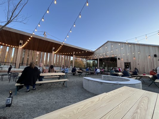 Large outdoor area and fire pit.