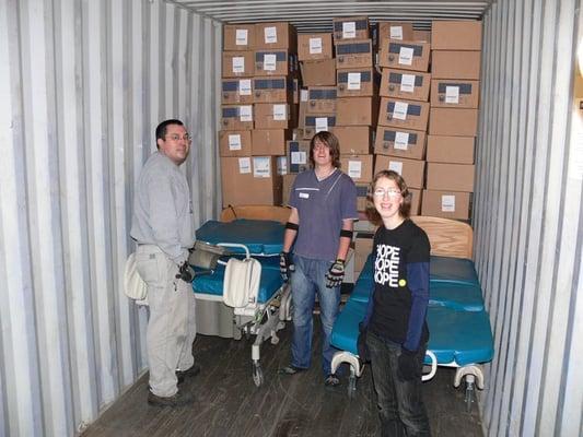 Volunteers help load container of aid destined for Ecuador (12/08).