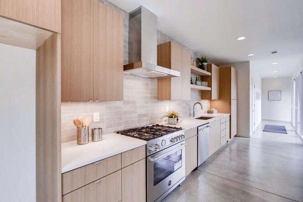 Polished concrete completes this beautiful kitchen.