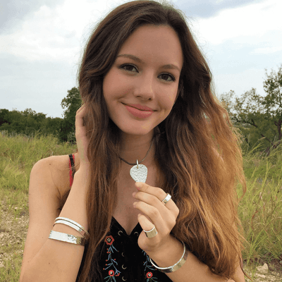 Our Backyard Silversmiths® silver guitar pick necklace is a really cool piece for musicians or anyone who likes rocker-style jewelry!