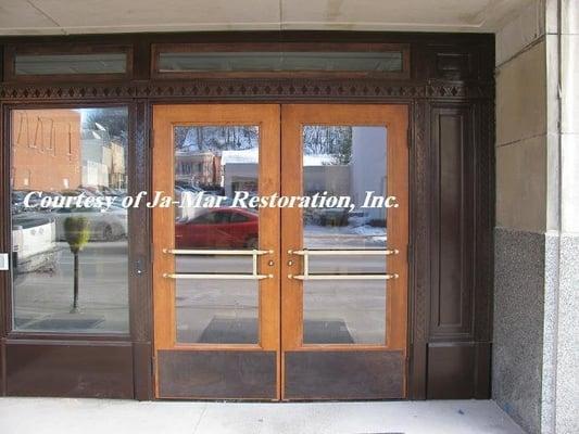 Roshek Building historically restored with cast iron door trim and bronze door pull and push handles in Dubuque, IA