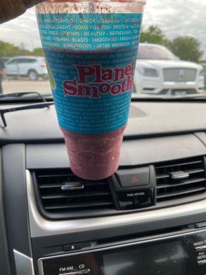 Açaí Smoothie with: strawberries,blueberries, and shaved coconut.