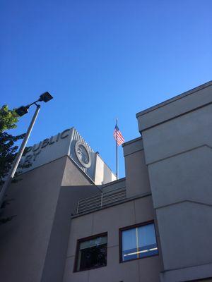 Flag atop the building.