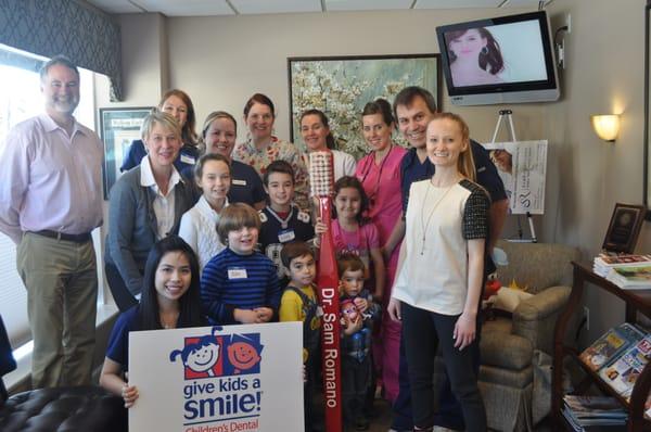 Dr Sam Romano and his team of volunteers Give Kids A Smile Day 2014