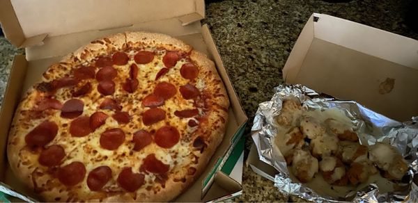 Pepperoni pizza and Garlic Parmesan Boneless Wings