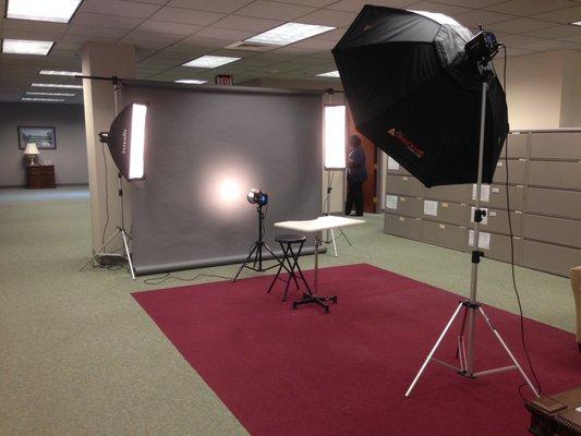 On-location headshots in office setting recommend 13ftx13ft area.