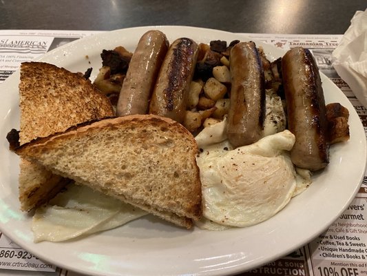 My eggs, home fries, sausage and toast