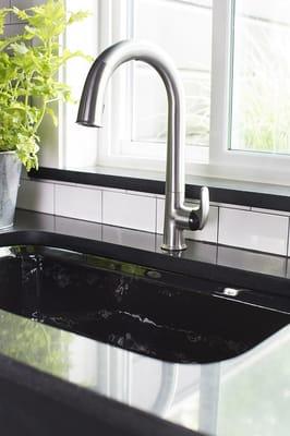 Kitchen faucet and sink combination, by Kohler.