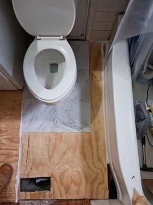 Bathroom sub floor rot repair. (During)