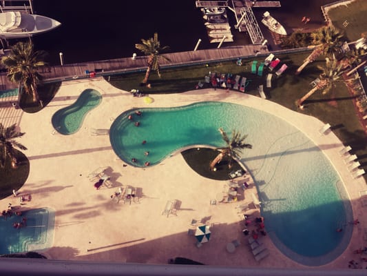 View of one of the pools from a penthouse suite.