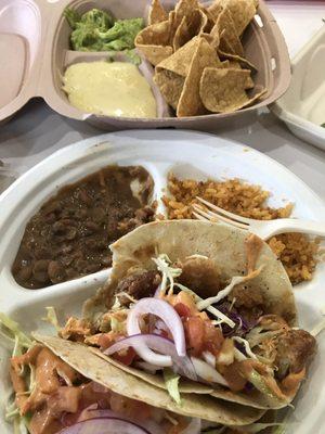 Fish Tacos, chips with queso and guacamole.  The guac is fresh!