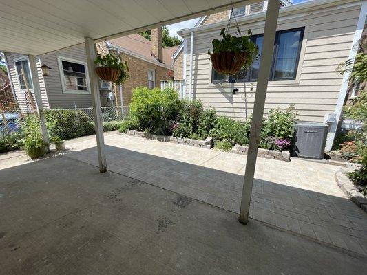 Super tiny Chicago backyard. Patch installed permeable pavers to replace our grass and fix our drainage issues.