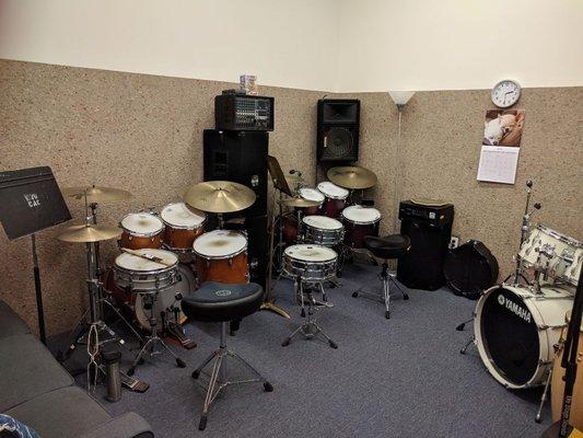 Drum studio with two full drum kits set up at all times.