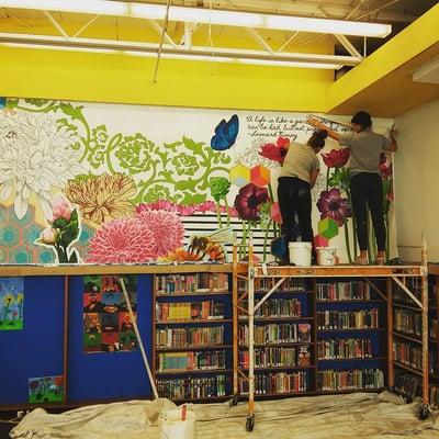 Putting up a new mural in memory of the late Ms. Anne Dougherty, our children's librarian for several years