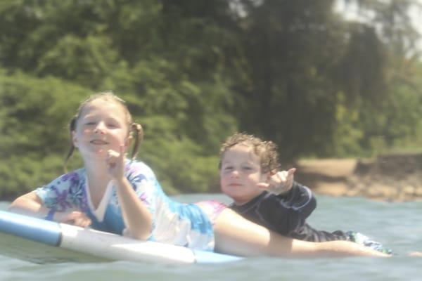 Our 4 and 6 year old loving their surf lesson with Suzy!