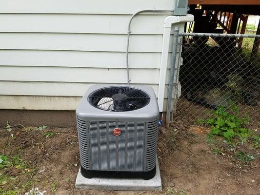 3 Ton A/C outdoor unit with line hide to conceal the refrigerant lines.