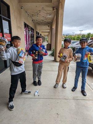 These cool kids grabbed snacks and toys to kick off their summer break!