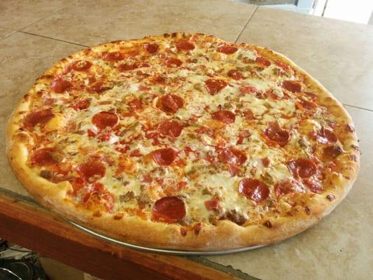 Meat Lovers Pizza. Loaded with Pepperoni, Sausage, Meatballs & Top Choice Beef.