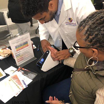 Patient receiving a health scan assessment